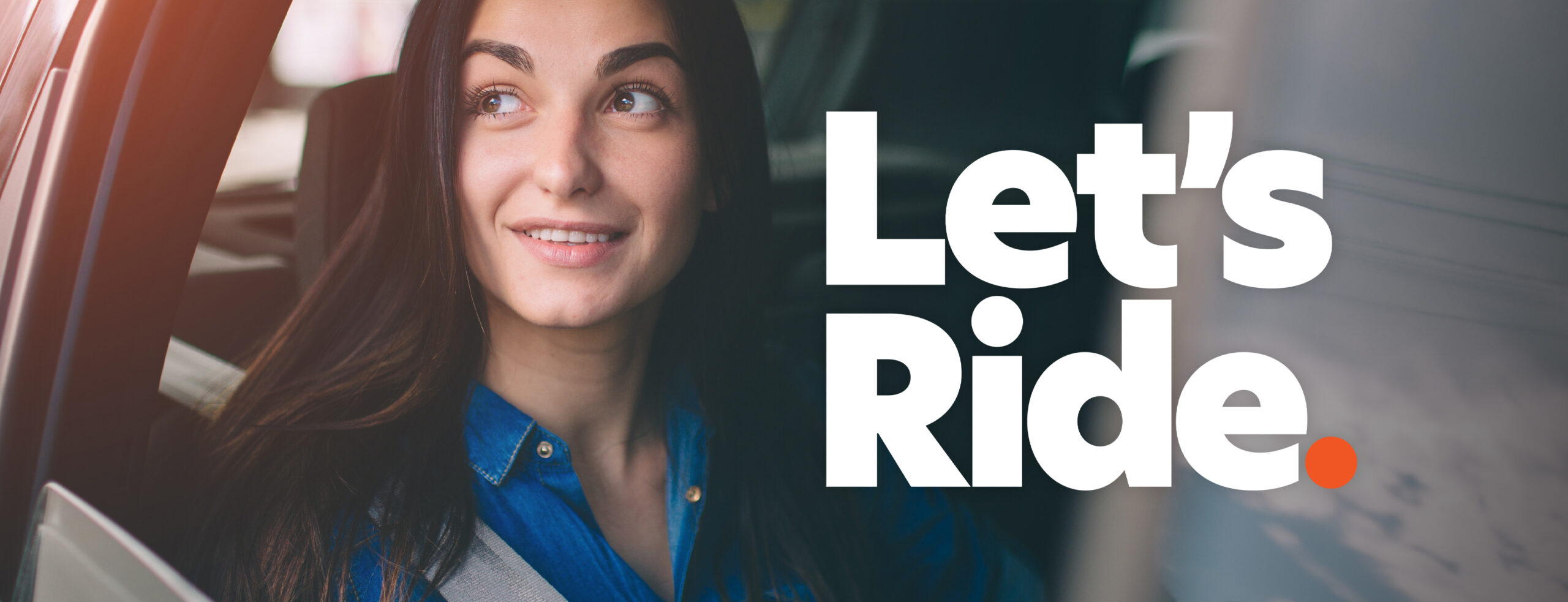 Woman in car with seatbelt on and text that says let's ride.